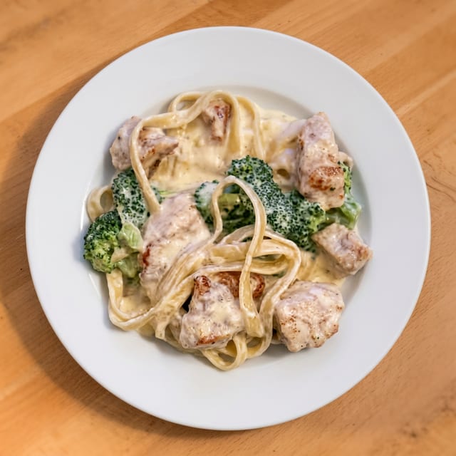 Chicken Alfredo Over Pasta.